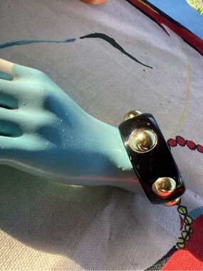 Vintage black lucite bangle with dome studs